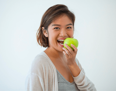 Women eating an apple