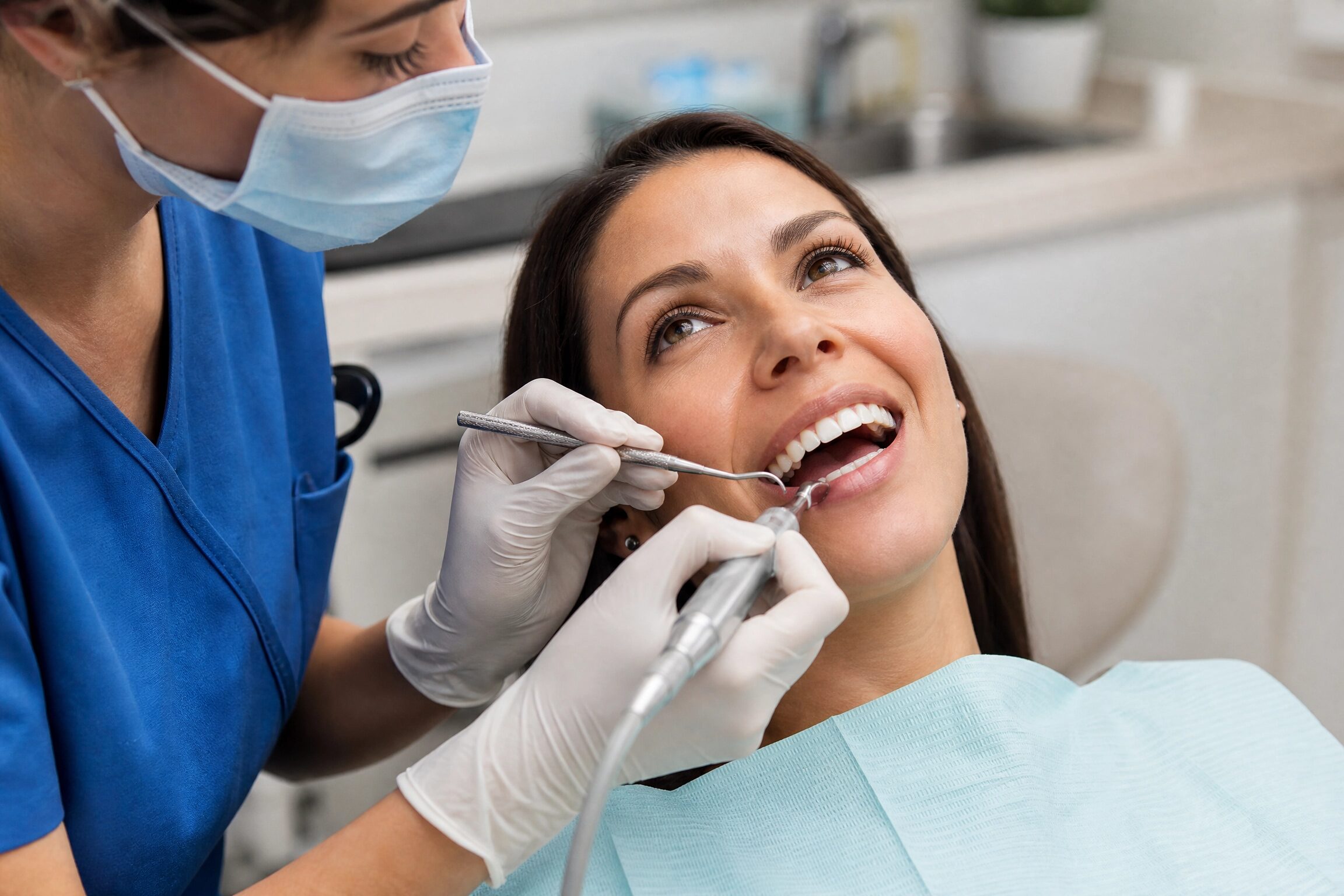 Professional dental cleaning for an adult patient at Centerville Dental Center